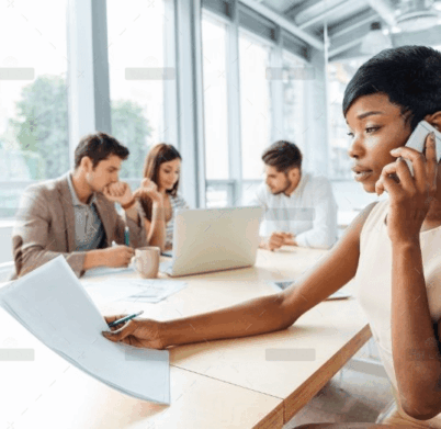 serious-businesswoman-with-documents-talking-on-P9Q6LX6@2x.png